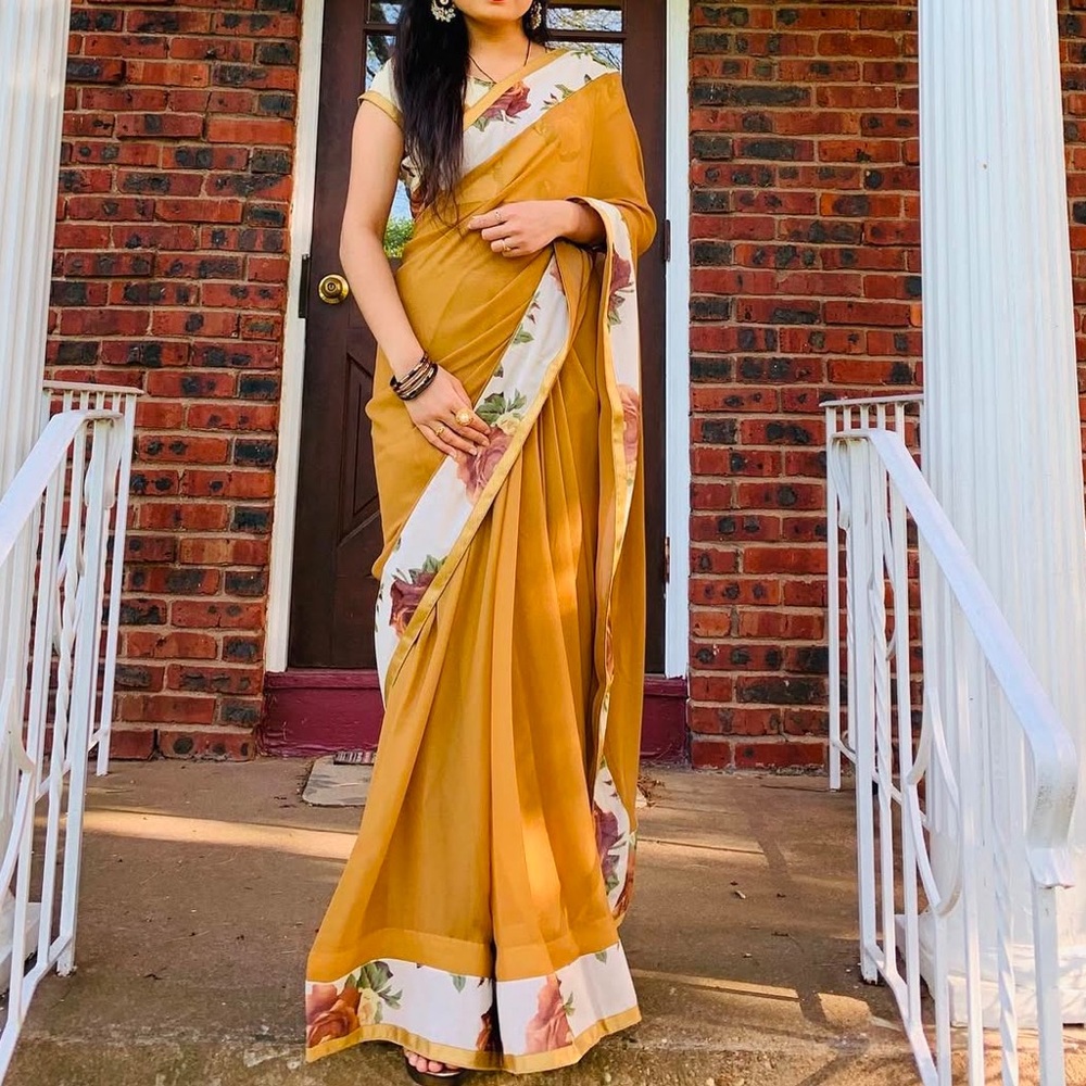 All over shimmery Saree with Flower Border
